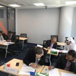 Delivering a training at Qatar Finance and Business Academy
